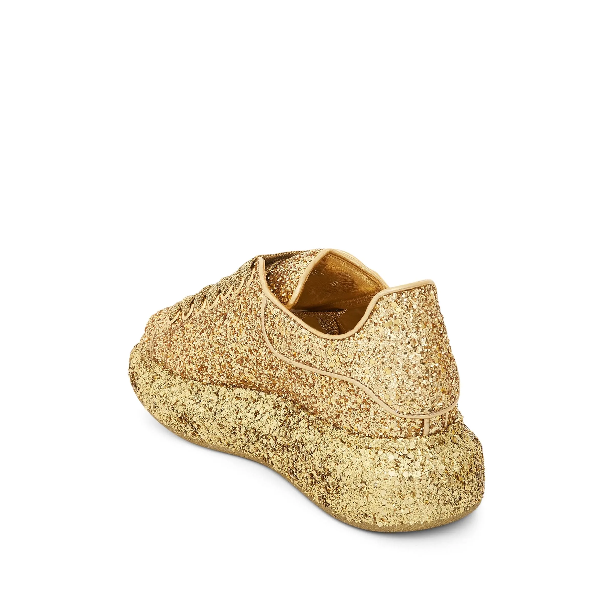 Larry Oversized Heel Glitter Sneaker in Gold